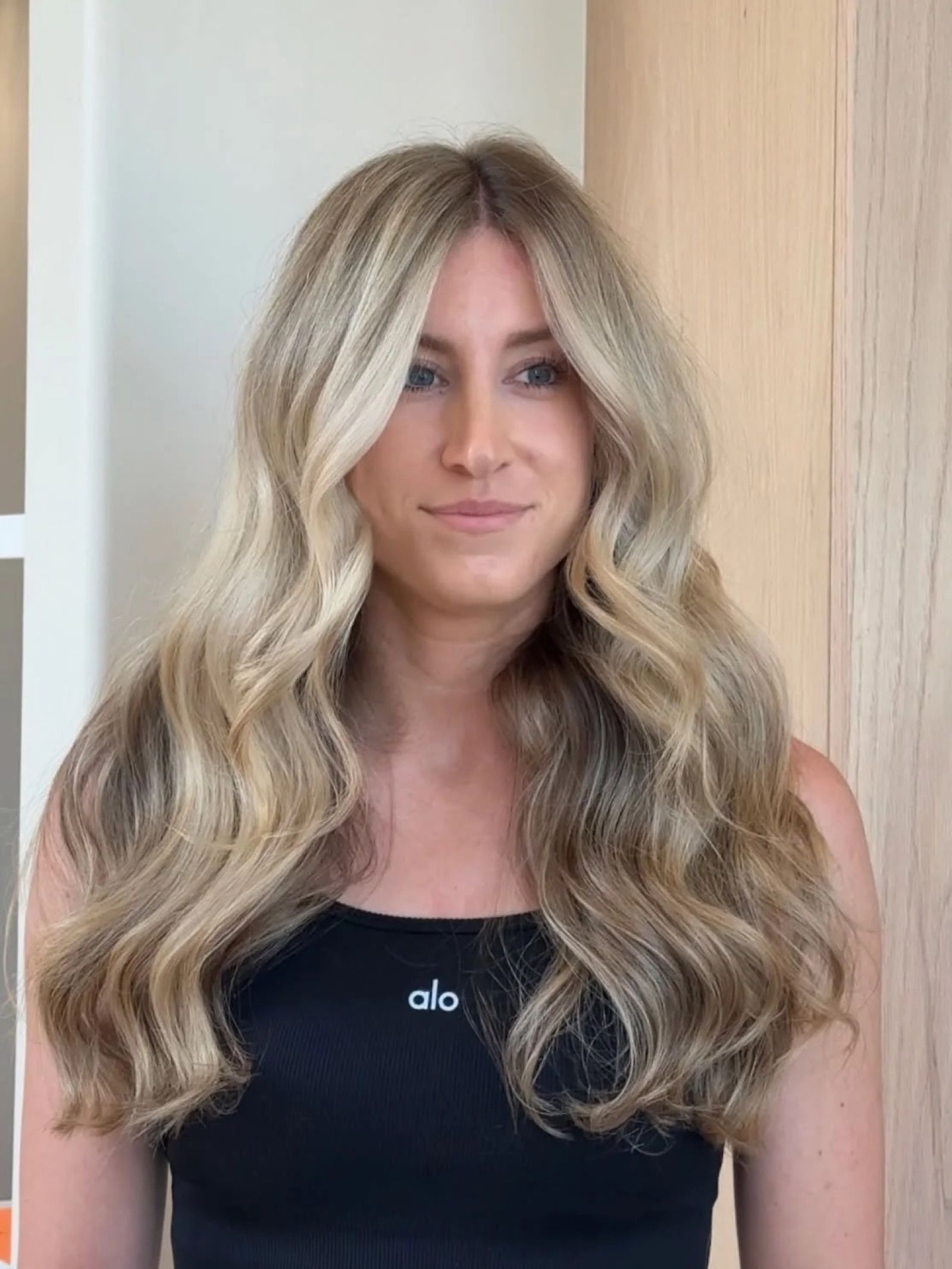 Lived-in blonde result with soft, multidimensional color at LŪK House of Beauty, Norman OK