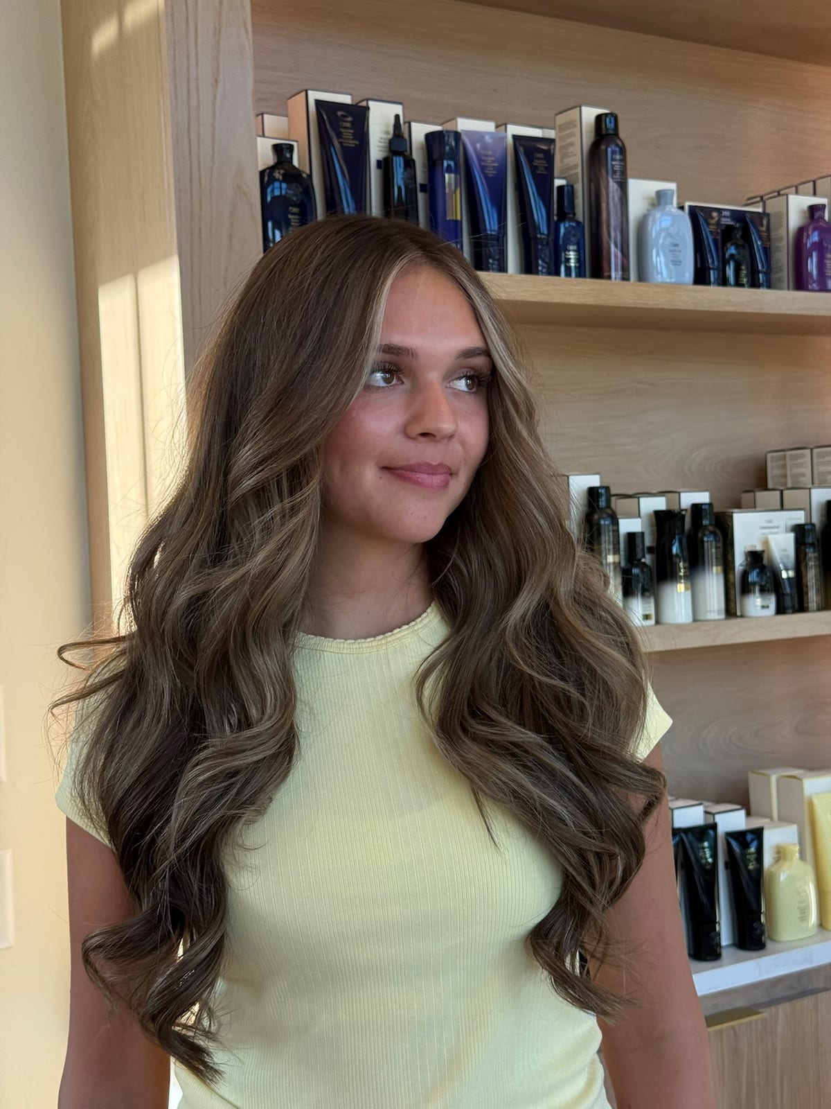 Finished brunette color and cut in front of the product wall